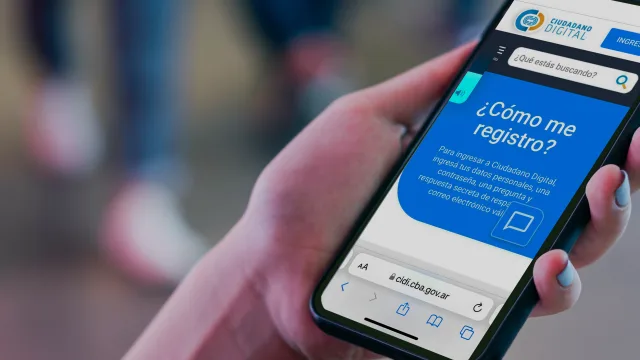 Pantalla de teléfono muestra página de registro en plataforma Ciudadano Digital de Córdoba con preguntas sobre cómo registrarse