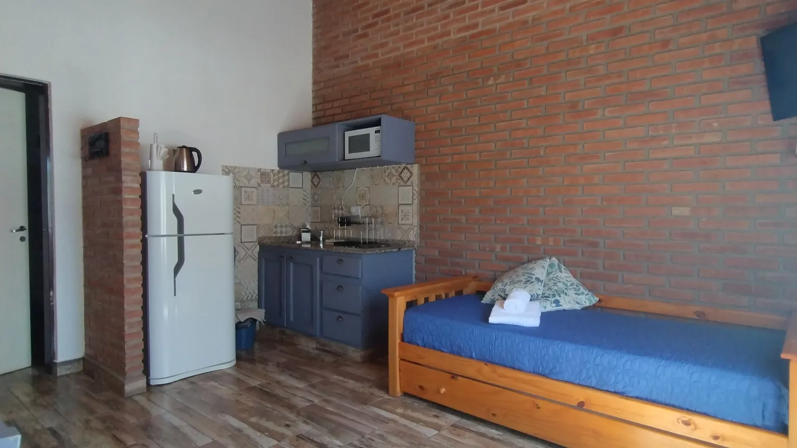 Sala de estar , cocina con anafe eléctrico